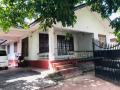 Land with House for sale at Thihariya Junction.